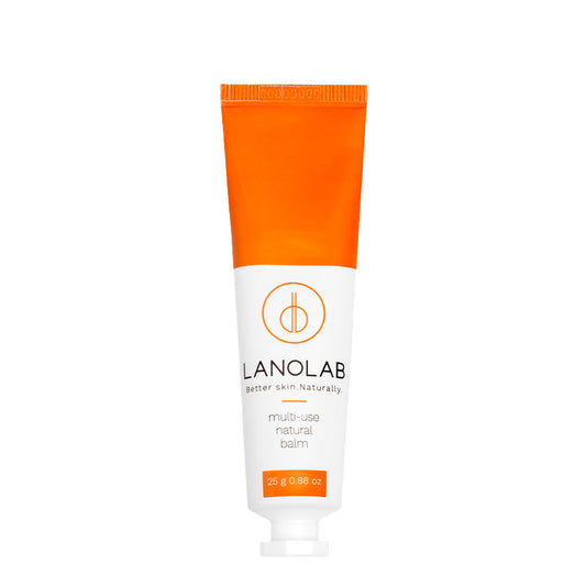 A tube of Lanolab Multi-Use Balm with orange packaging and a white label.