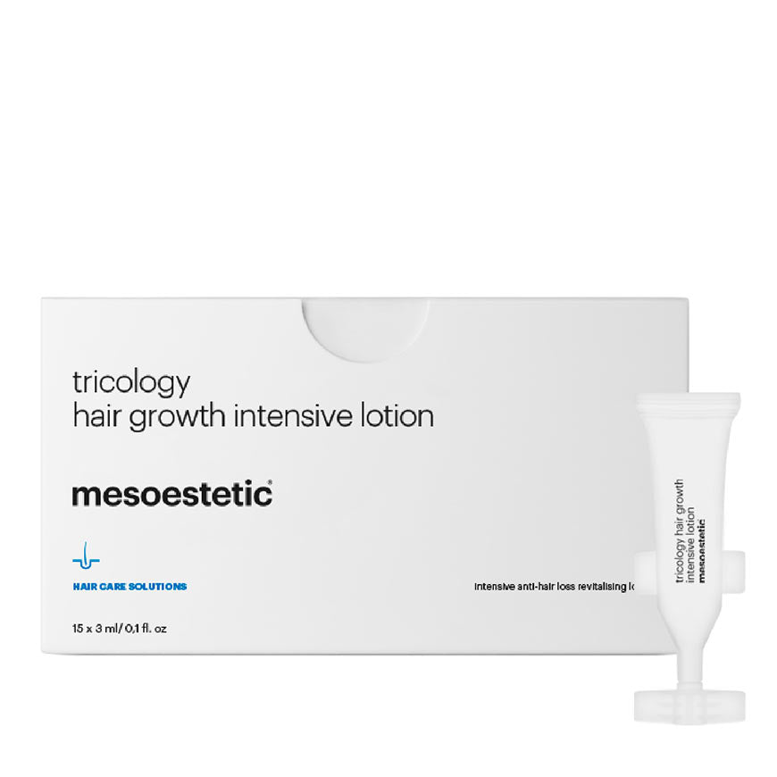 Packaging of Mesoestetic Tricology Hair Growth Intensive Lotion, with the product visible in a small white tube, against a white background.