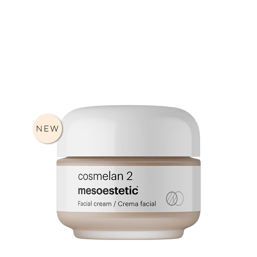 Cosmetic cream jar labeled 'cosmelan 2' by 'mesoestetic' on a white background
