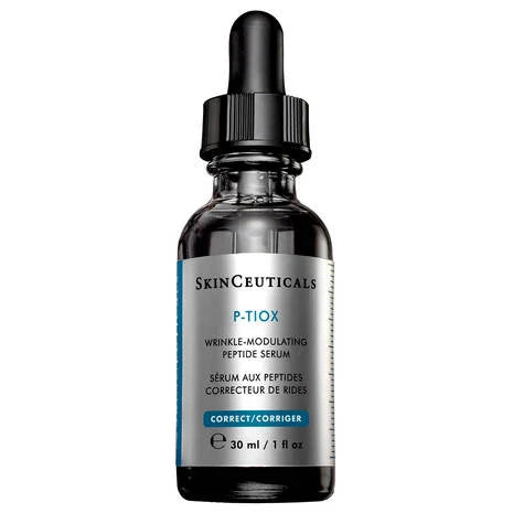 A bottle of Skinceuticals P-TIOX wrinkle modulating peptide serum with a dropper, labeled for correcting wrinkles and refining skin texture.