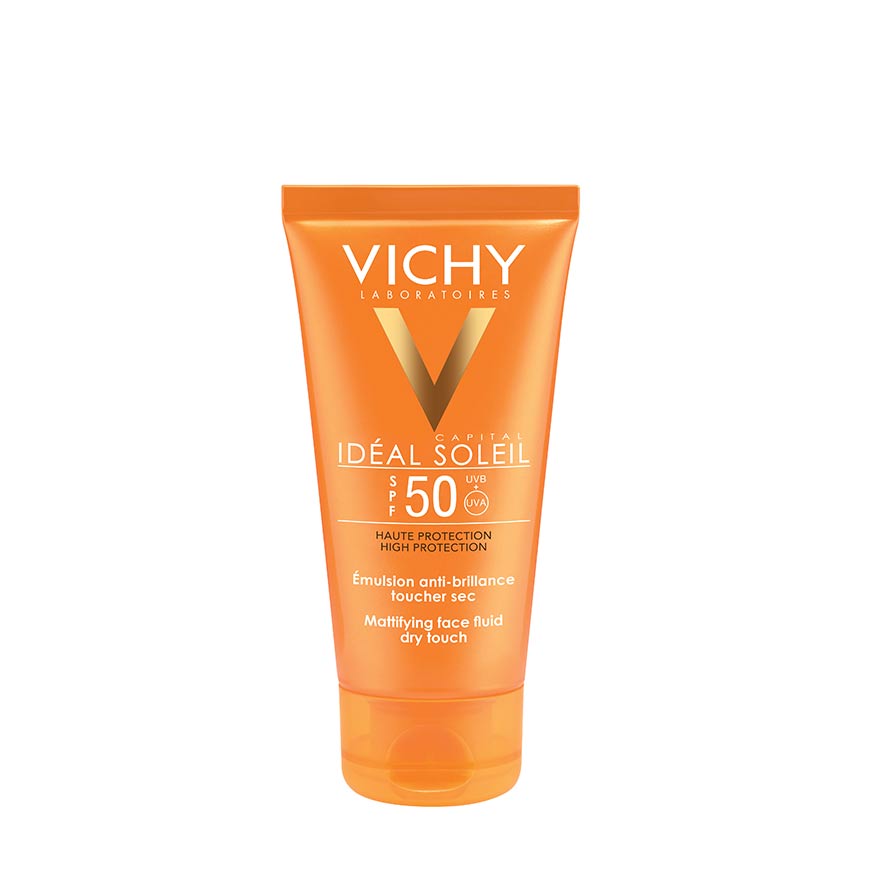 A tube of VICHY IDEAL SOLEIL SPF50 sun cream in an orange packaging.