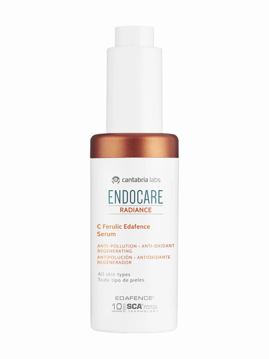 A bottle of Endocare Radiance C Ferulic Edafence Serum with a white label and a copper-colored cap.
