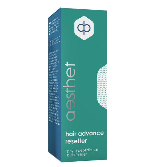 A box of Essel Aesthet Hair Advance ReSetter, which is marketed as a hair loss treatment product with 'Phyto-Peptidic hair bulbs'. The packaging is predominantly teal with white and grey text.