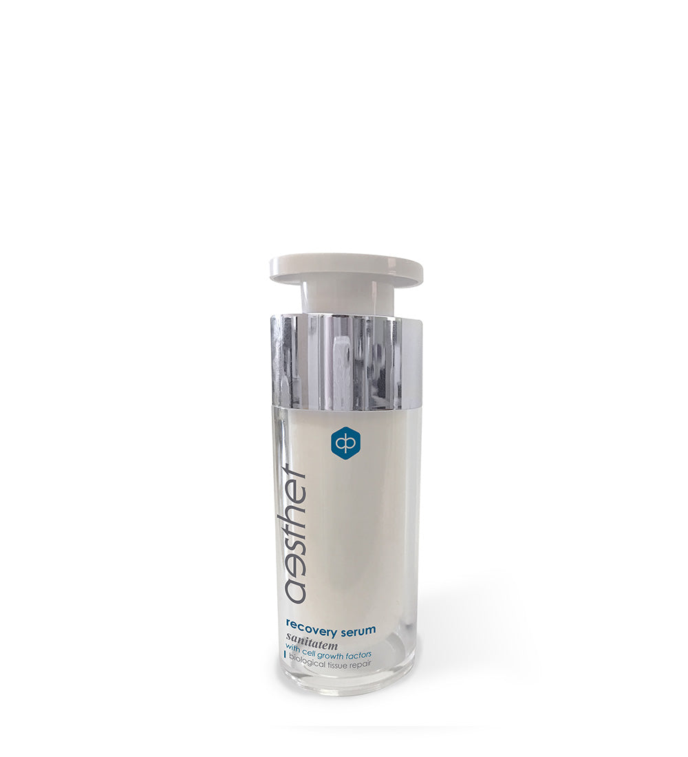 A clear glass bottle containing a white liquid labeled 'Aesthet Recovery Serum', with a white cap.