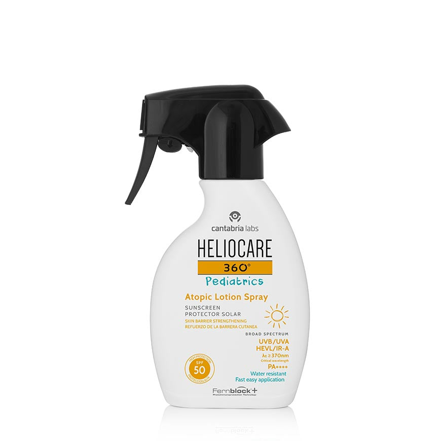 A bottle of Heliocare 360 Pediatric Atopic Pistola SPF50 photoprotector lotion with a spray nozzle.