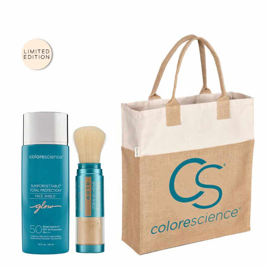 Colorescience limited edition setwith brush on sunscreen  in blue a blue and siler face protection spf 50 container and a branded carry bag in beige and white