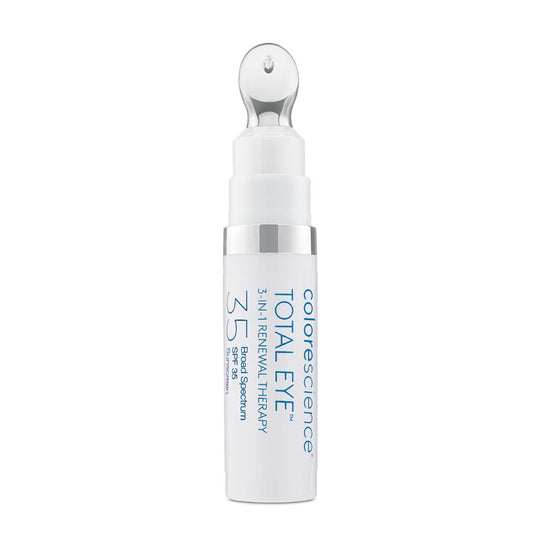 A tube of COLORESCIENCE Total Eye 3-in-1 Renewal Therapy Eye Cream with SPF 35, showing a white and silver color scheme.