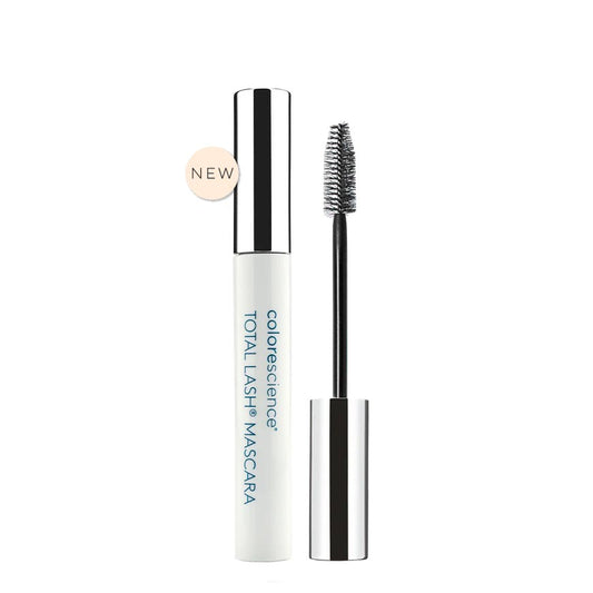 A tube of COLORESCIENCE Total Lash Mascara with the cap off, showing the black mascara wand and the product's name printed on the tube.
