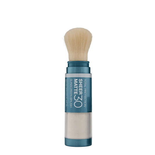 A compact mineral sunscreen brush with a matte finish, labeled SPF 30, in a beige shade, with a blue cap and a brush applicator.