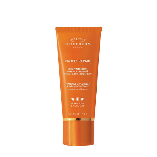 Institut Esthederm Bronz Repair sunscreen tube on a white background