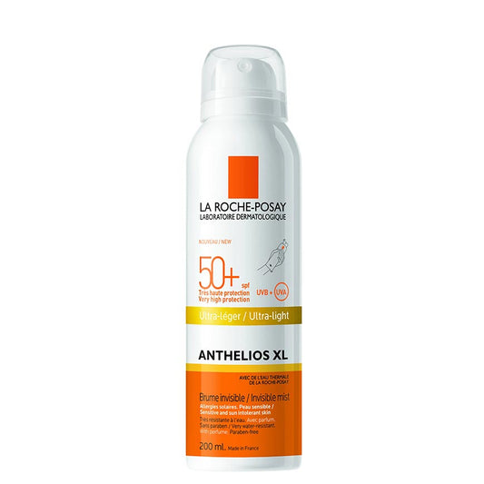 An aerosol spray bottle of La Roche-Posay Anthelios XL Invisible Body Mist with SPF 50+ sunscreen.