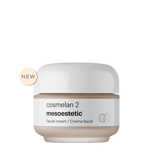 Cosmetic cream jar labeled 'cosmelan 2' by 'mesoestetic' on a white background
