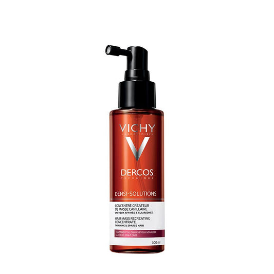 A bottle of VICHY DERCOS DENSI-SOLUTIONS CONCENTRATE, designed for thinning and sparse hair, with a black pump dispenser.