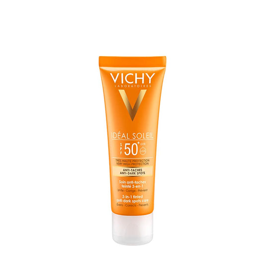 A tube of VICHY IDEAL SOLEIL ANTI DARK SPOT sunscreen with a high SPF rating, labeled in orange and white.
