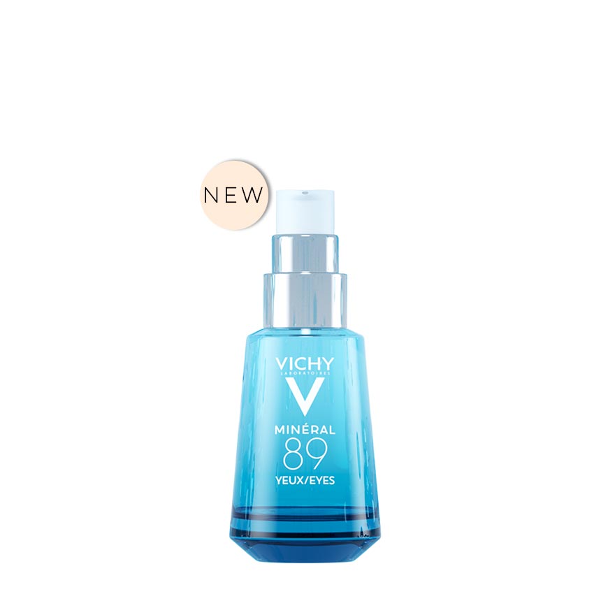 A blue pump bottle labeled 'VICHY MINERAL 89 EYES' indicating a hyaluronic acid eye gel.