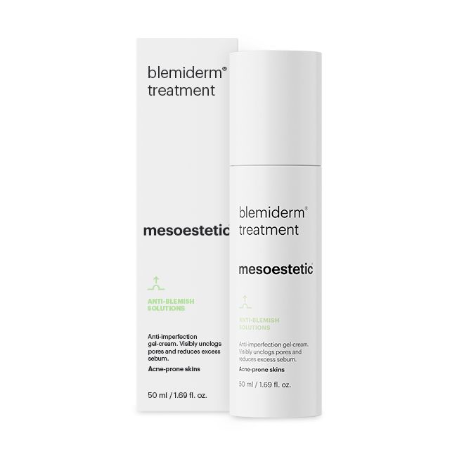 A skincare product named 'blemiderm Treatment' by Mesoestetic, packaged in a white bottle with green and black text, accompanied by its box which has matching color scheme.
