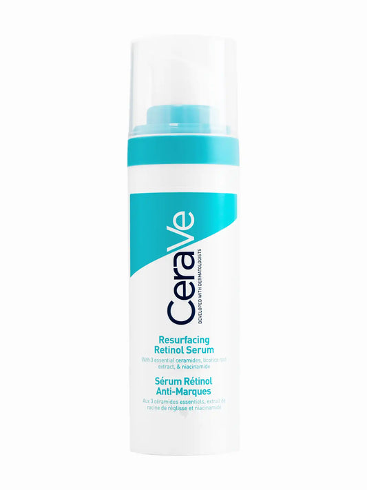 A bottle of CeraVe Resurfacing Retinol Serum with a white and blue label, indicating that it is a dermatologist-developed formula designed for acne-prone skin and dark marks.