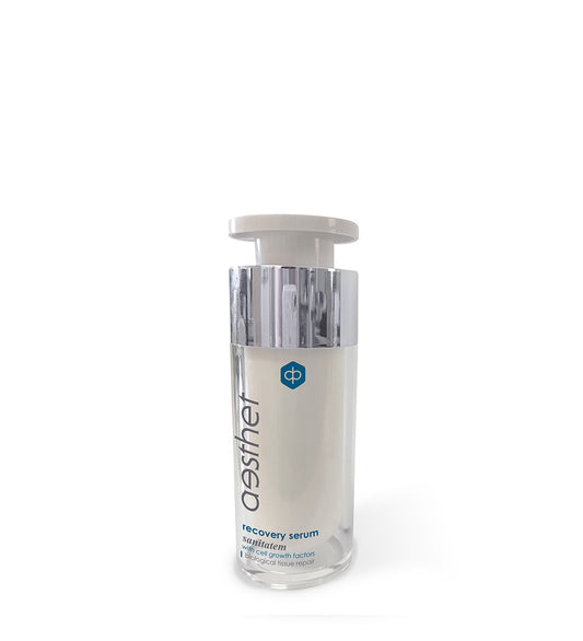 A clear glass bottle containing a white liquid labeled 'Aesthet Recovery Serum', with a white cap.
