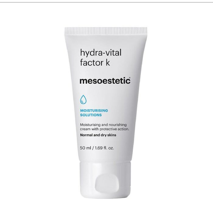 A white tube packaging of 'Hydra-Vital factor K' moisturizer by Mesoestetic with blue and grey text detailing the product's purpose for normal to dry skin types.
