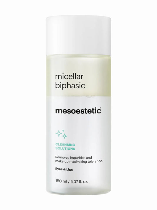 A clear plastic bottle with a white label, labeled as 'Micellar Biphasic' from the brand Mesoestetic, indicating it is a make-up remover product for the eyes and lips.