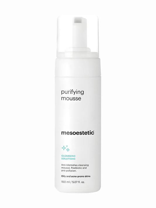 A pump bottle of Mesoestetic purifying mousse with a white label and blue text.