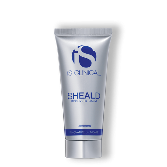A tube of SHEALD Recovery Balm with a blue and white label, indicating it is a product by Is Clinical.