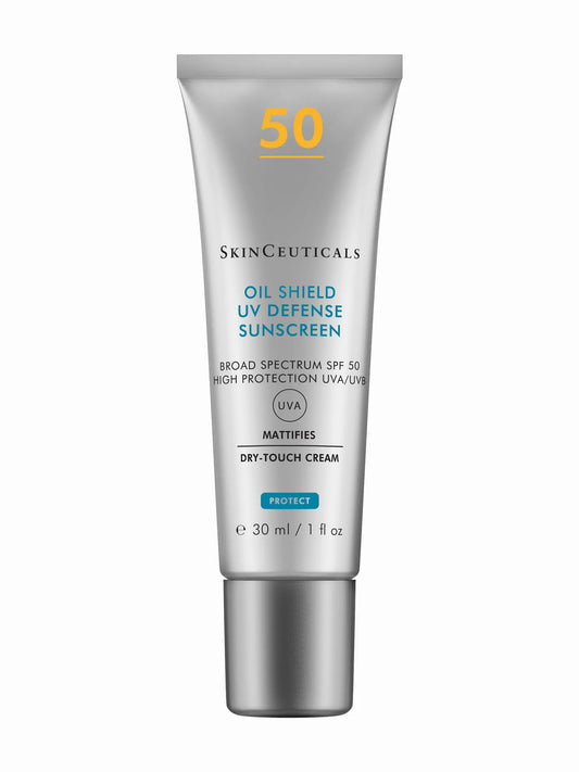 SkinCeuticals Oil Shield UV Defense SPF 50 in a white tube with blue and green text detailing the product features and sun protection factor.